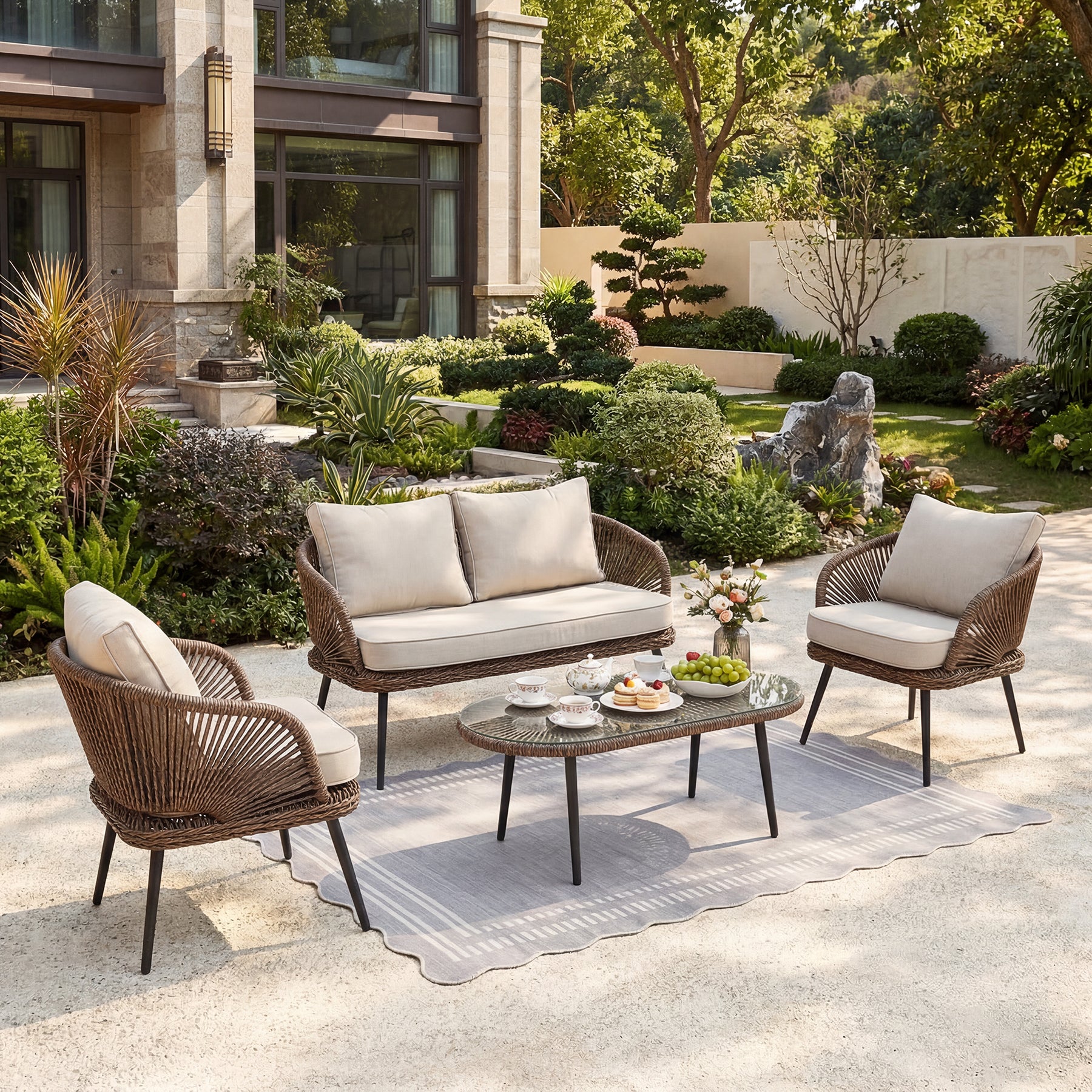 4-Piece Rattan Outdoor Patio Furniture Set with Removable Cushions and Coffee Table