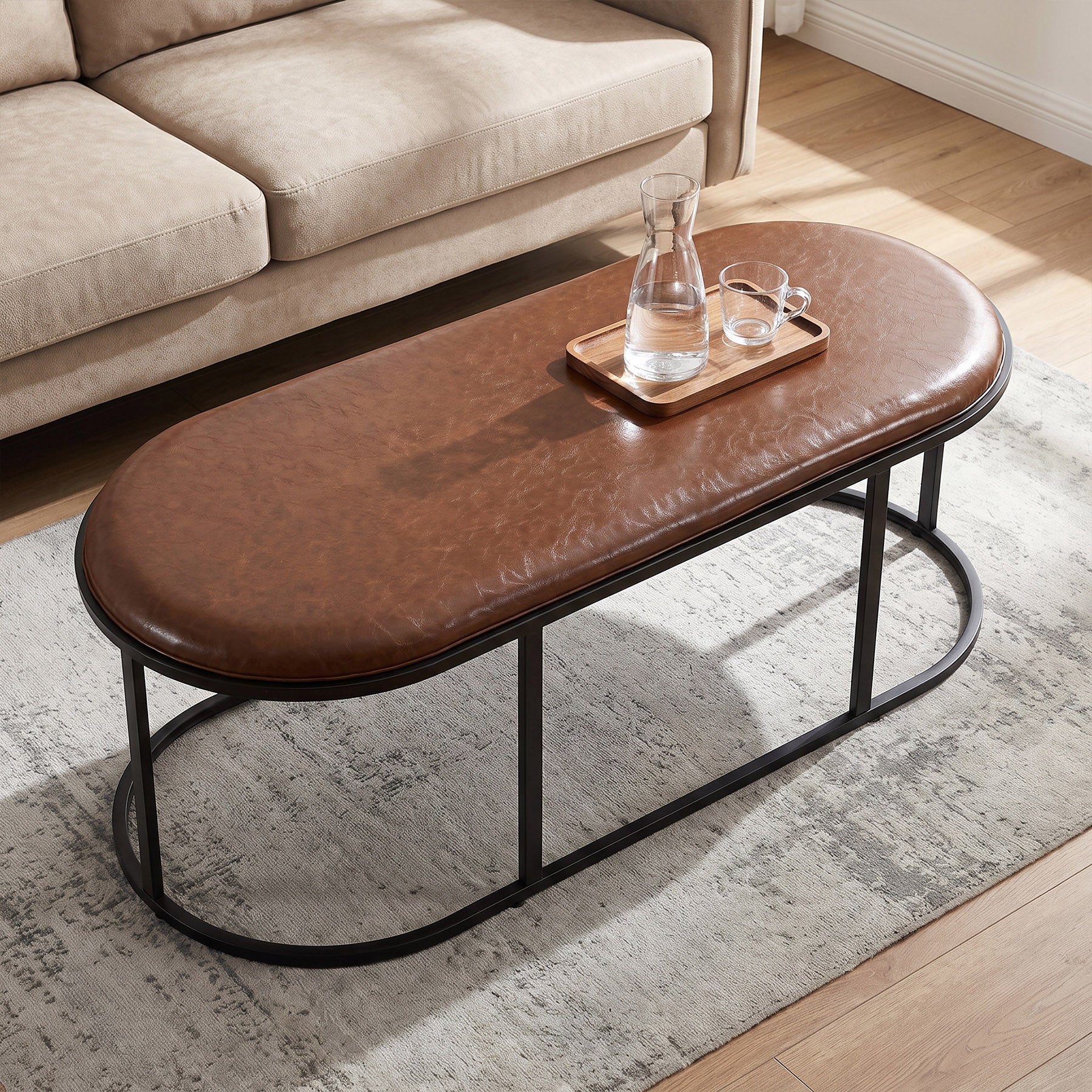 Oval Faux Leather Coffee Table, 55.12" Upholstered Center Table with Metal Base