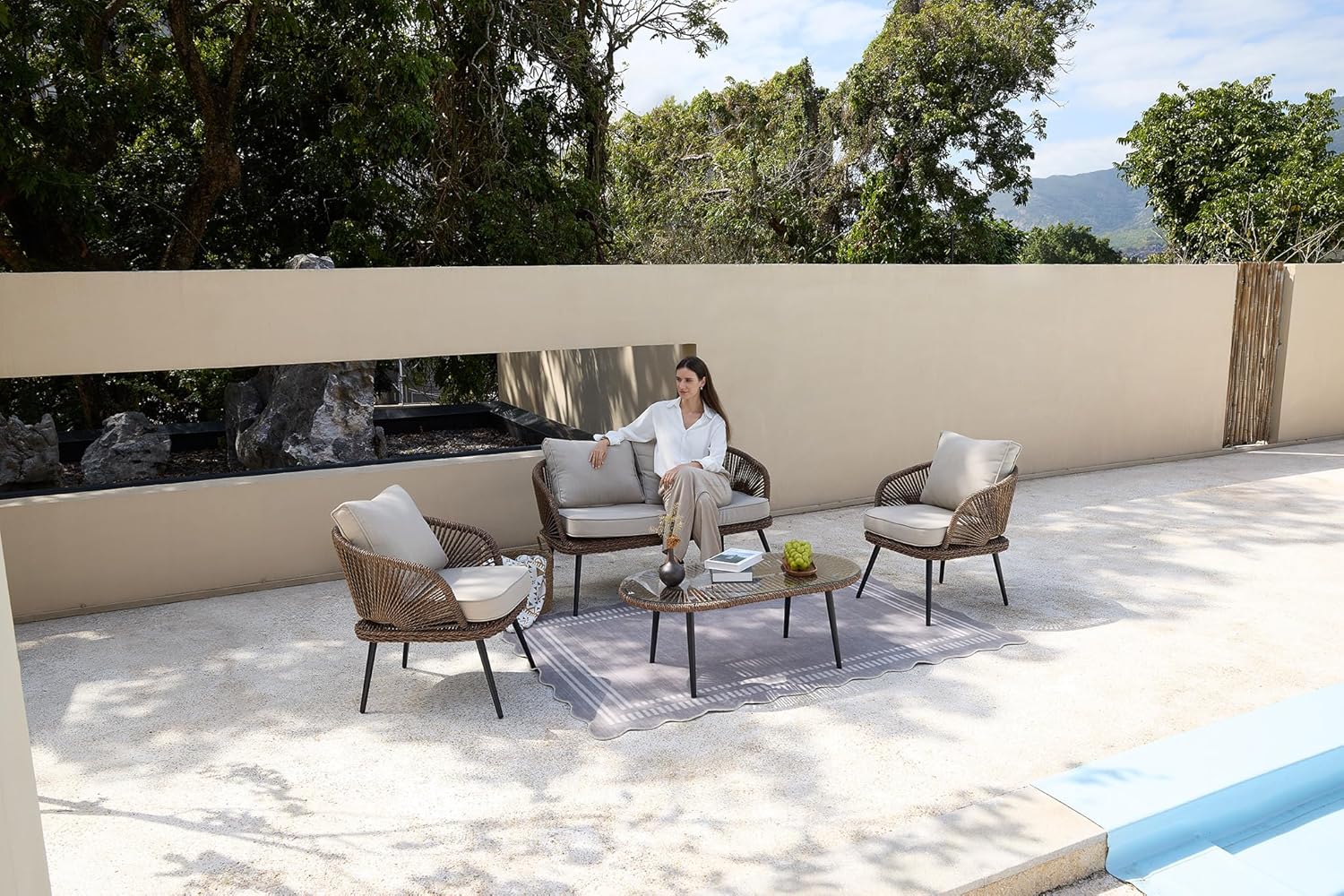 4-Piece Rattan Outdoor Patio Furniture Set with Removable Cushions and Coffee Table